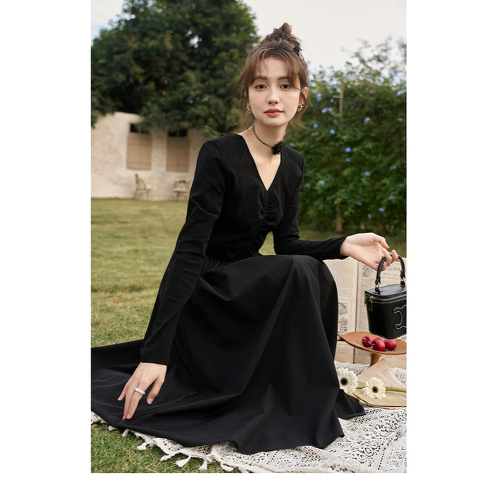 Elegant Black Knitted Smocked V-neck A-line Midi Dress