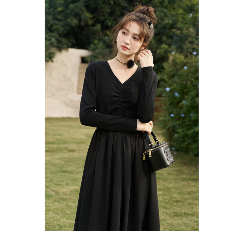 Elegant Black Knitted Smocked V-neck A-line Midi Dress